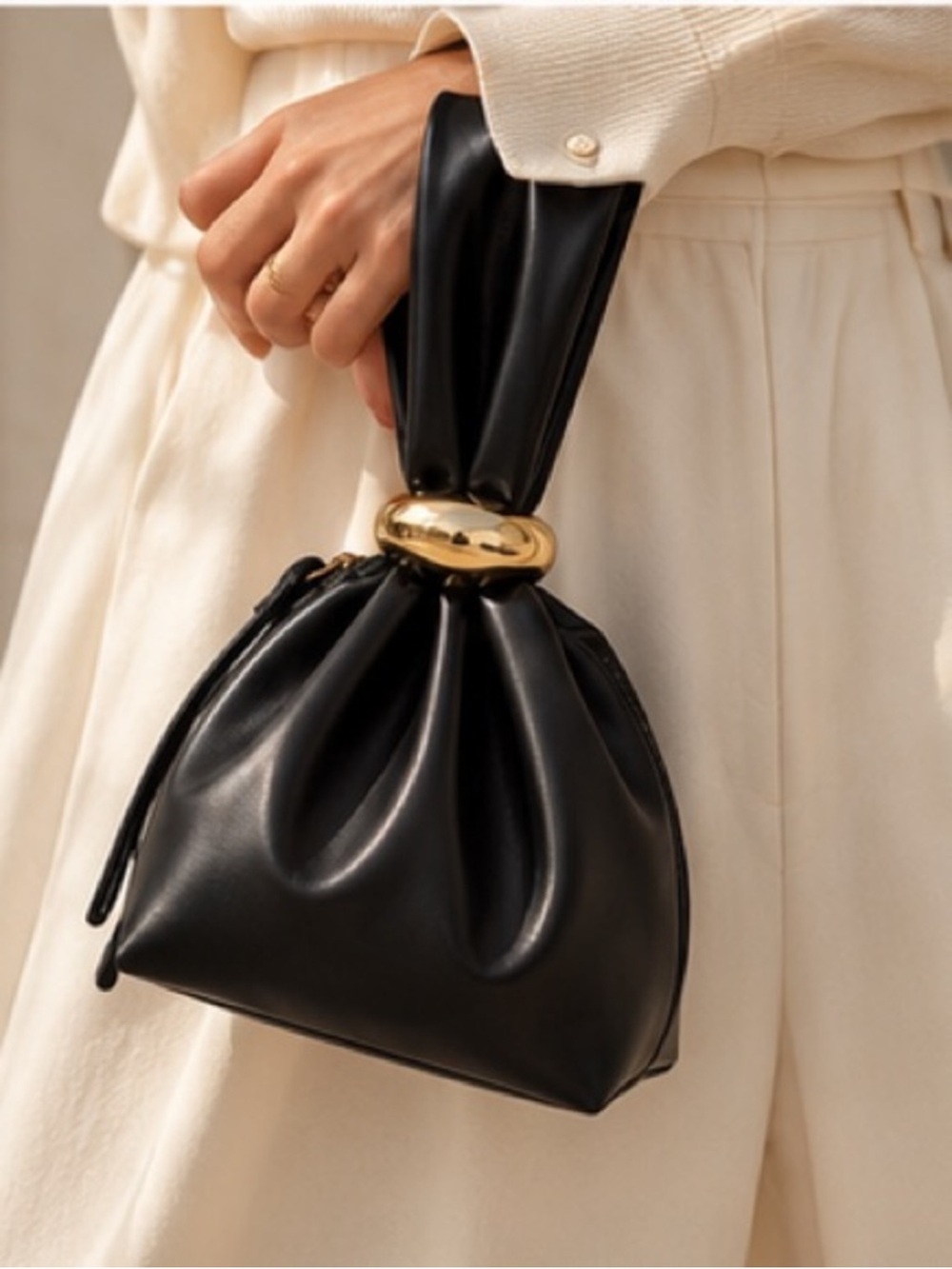 Modern Black Wristlet Clutch with Gold Ring